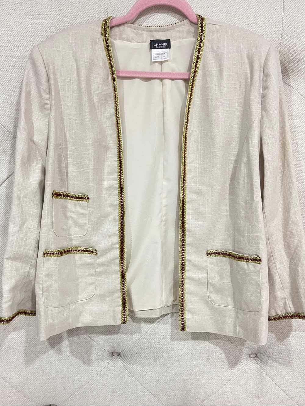CHANEL Uniform Cream Open-Front Jacket with Gold Trim